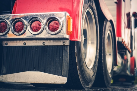 rear lights of a red semi truck