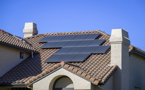 Solar panels on rooftop in California. stock photo